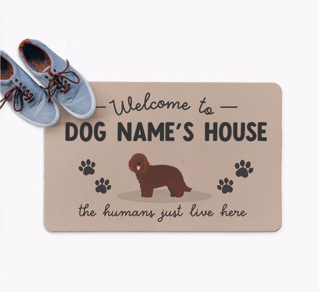 The Humans Just Live Here: Personalised {breedFullName} Doormat